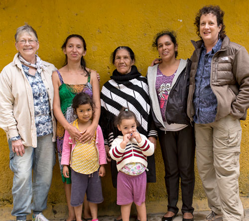 Delegates and family of a coffee farmer