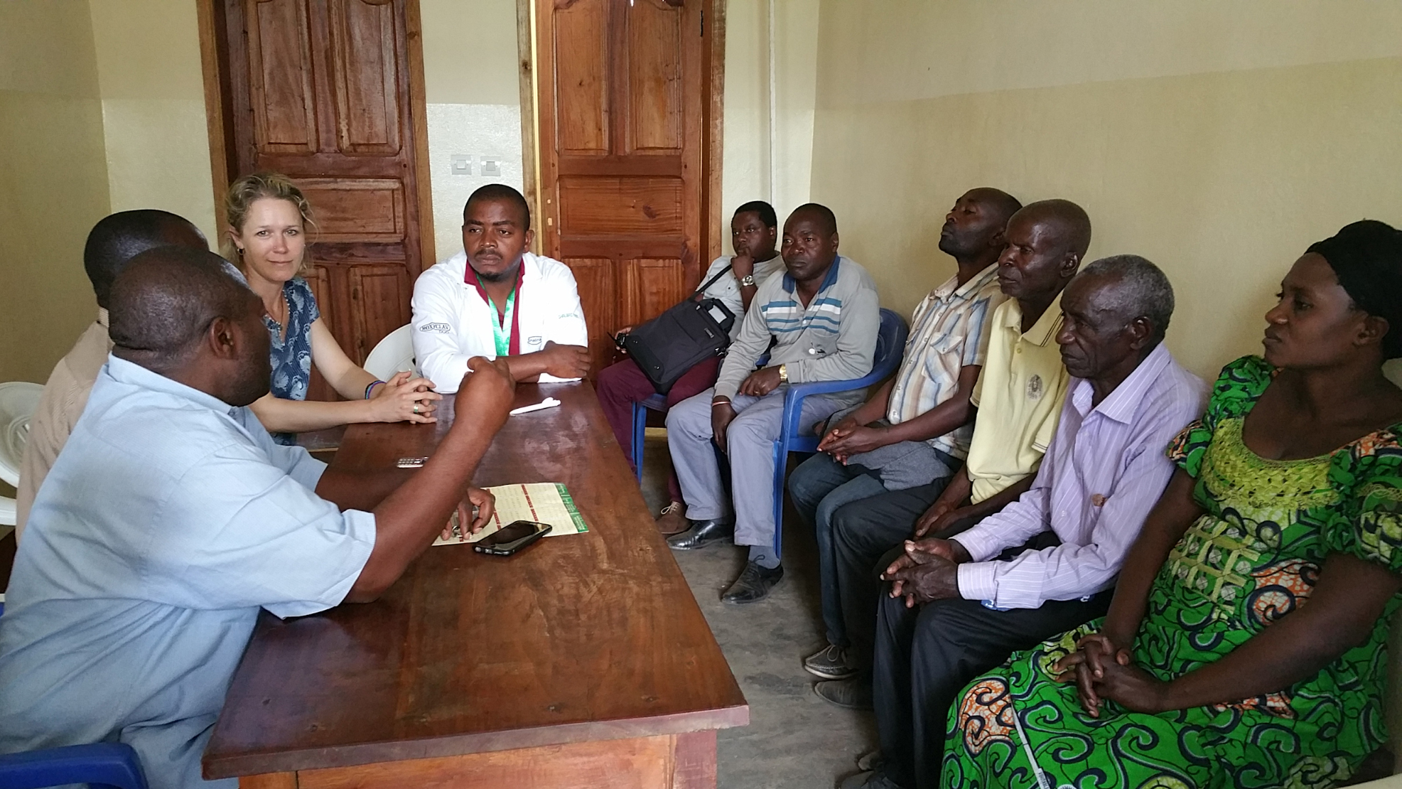 Bulenga Clinic staff meet with Beth Ann and representatives of SOPACDI to talk about the clinic and needs of the community