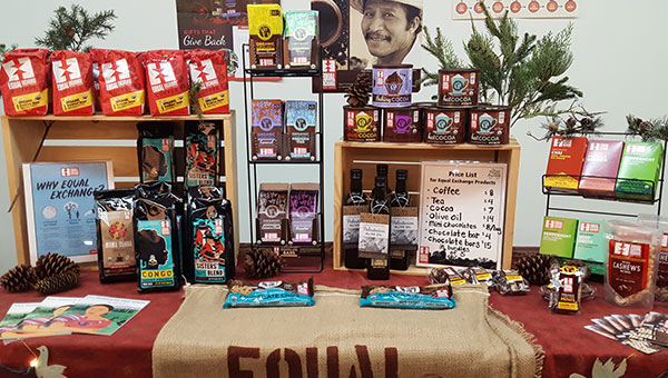A holiday sale table set up with Equal Exchange products