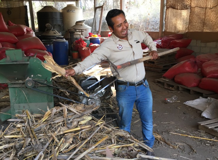 Alonso Gomez Hernandez, a member of the CYN staff shows off some of the raw material that gets transformed into organic fertilizer