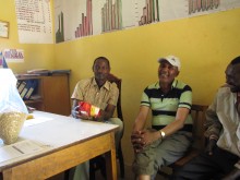 Members of Fura Coop looking at a bag of Equal Exchange Ethiopian Coffee
