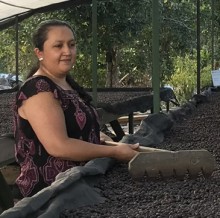 Irma Garcia, coffee farmer, drying coffee